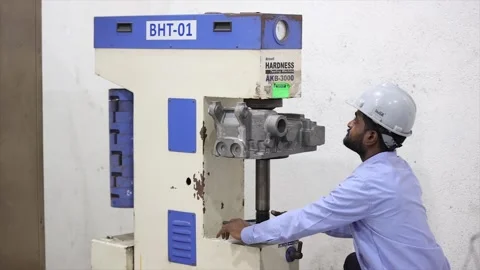 Industrial engineer performing Brignell hardness test on a metal casting 스톡 동영상 321741696