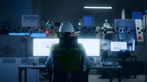 Industrial Engineer Solving Problems, Working on a PC, Monitor Show CAD Software Stock Footage 125480359