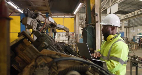 Industrial engineer use computer laptop control, programing automation robot arm 스톡 동영상 152910982