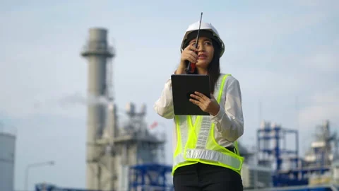 Industrial engineer using digital tablet for work against the electrical plant. Stock Footage 232505245