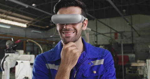 Industrial Engineer Using Virtual Reality Technology Operate Robotic Arm Machine Video stock 265576217