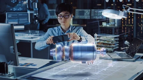Industrial Engineer Works with Smartphone Using Augmented Reality Stock Footage 116721149