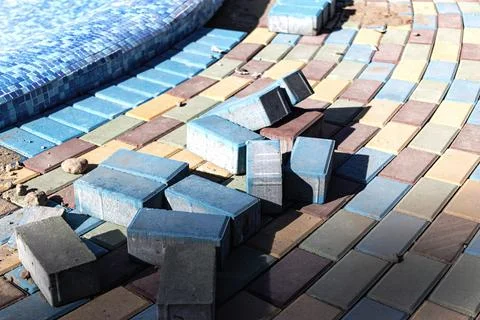Industrial engineering. Professional tiling in the pool. Installation Stock Photos