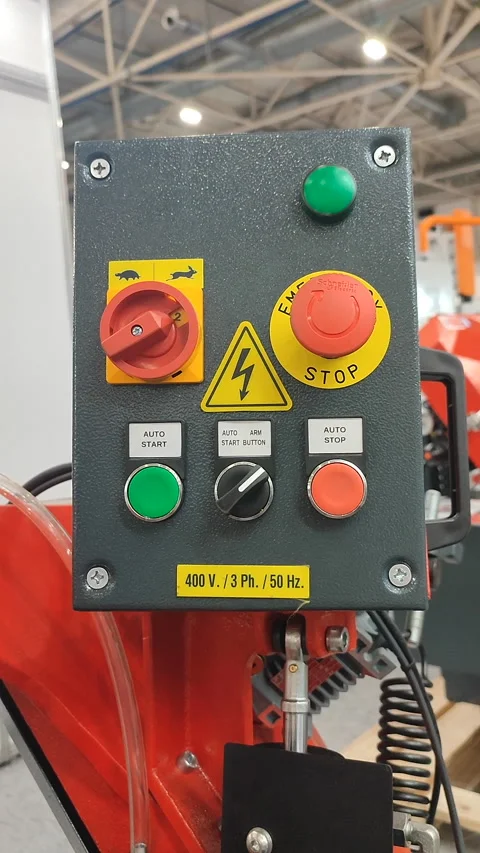 Industrial equipment control panel several buttons switches Red stop Vertical Stock Footage 324190051