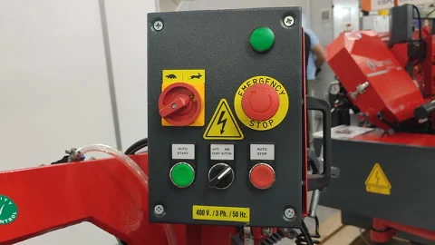 Industrial equipment control panel several buttons switches Red stop Video stock 324989320