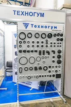 Industrial exhibition booth for Technium, showcasing circular seals and o-r.. Stock Photos