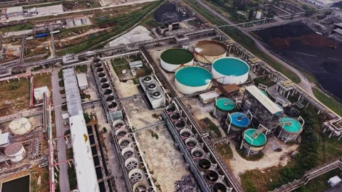 Industrial facility with storage tanks and equipment in operation Stock Footage 340383352