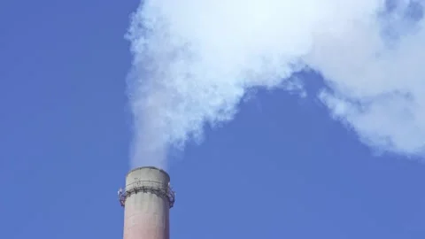 Industrial factory chimney is smoking the environment with carbon dioxide Stock Footage
