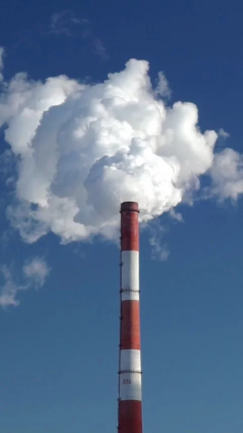 Industrial Factory Chimney Stack Emitting Heavy White Smoke in Blue Sky Stock Footage 346399268