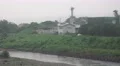 Industrial Farming Buildings On Tama River On Rainy Foggy Day 4K 4k or 4k+ Resolution