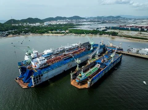 Industrial Floating Dry Docks Performing Vessel Maintenance In Coastal Wate.. Stock Photos