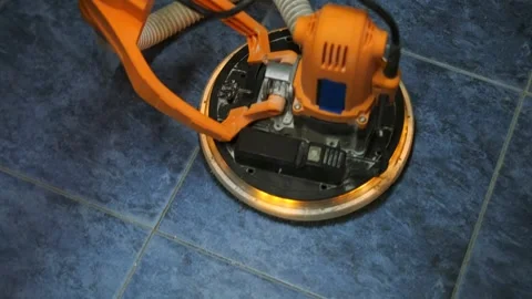 Industrial floor polishing machine scrubbing tiled surface indoors, professional Stock Footage 334862005