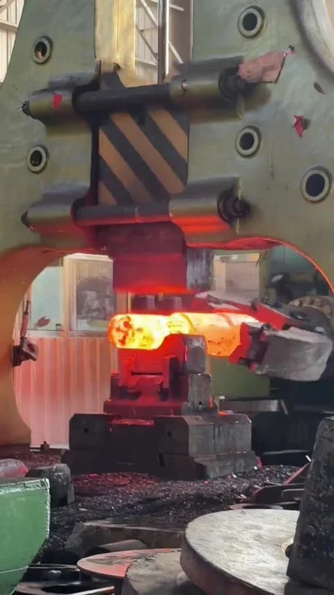 Industrial Forging Machine Pressing Red Hot Metal Bar in Steel Factory China Stock Footage 339203370