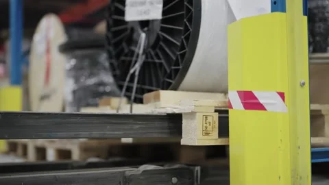 Industrial forklift unloading cable spool reel and pallet in warehouse facili Video stock 331891241
