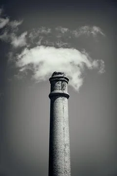 Industrial Ghost: Monochromatic Chimney Stock Photos
