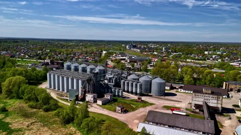 Industrial grain elevator facility grain cereal storage agriculture harvest Stock Footage 308766222
