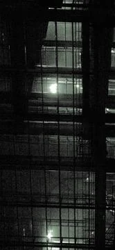 Industrial grid at night Stock Photos