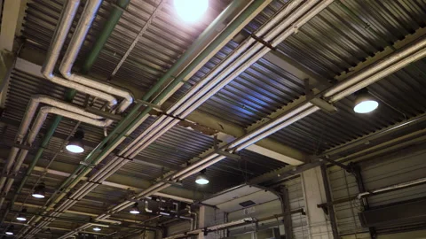 Industrial heating pipes under ceiling. Stockbeeldmateriaal 98122490
