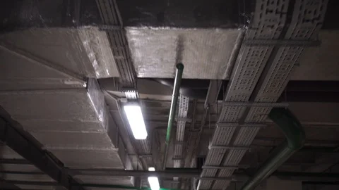 Industrial heating pipes under ceiling or another household communications 스톡 동영상 129772308