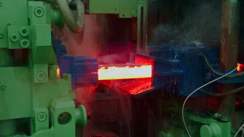 Industrial hot metal processing inside automated manufacturing plant. Stock Footage 337525647