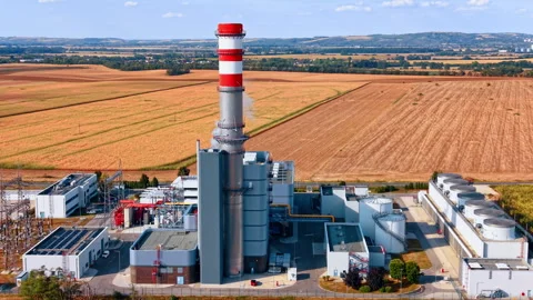 Industrial infrastructure layout in a rural setting, showing the integration of Stock Footage 345687904