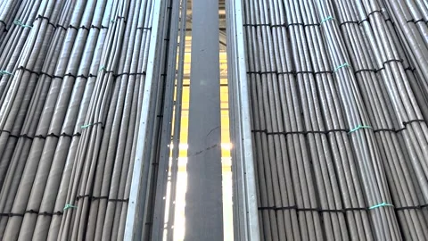 Industrial interior. Close-up of many cables in part of a cable rack routes Stockbeeldmateriaal 301694547