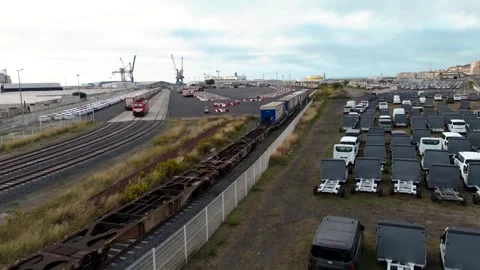 Industrial intermodal terminal showing a road-rail shunter vehicle, freight Stock Footage 338371489