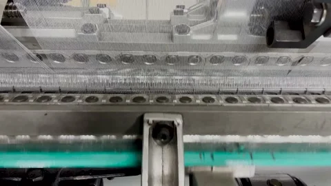 Industrial knitting machine for knitting textile fabrics Stock Footage 237955852