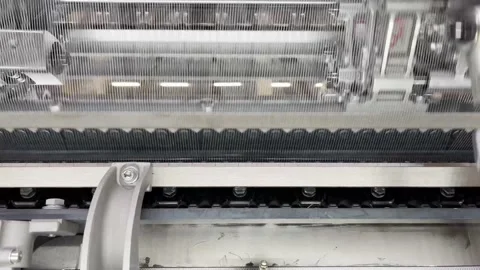 Industrial knitting machine for knitting textile fabrics Stock Footage 238024296