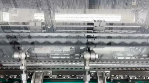 Industrial knitting machine for knitting textile fabrics Stock Footage 238026242