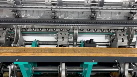 Industrial knitting machine for knitting textile fabrics Stock Footage 239680795