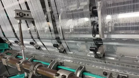 Industrial knitting machine for knitting textile fabrics Stock Footage 239681796