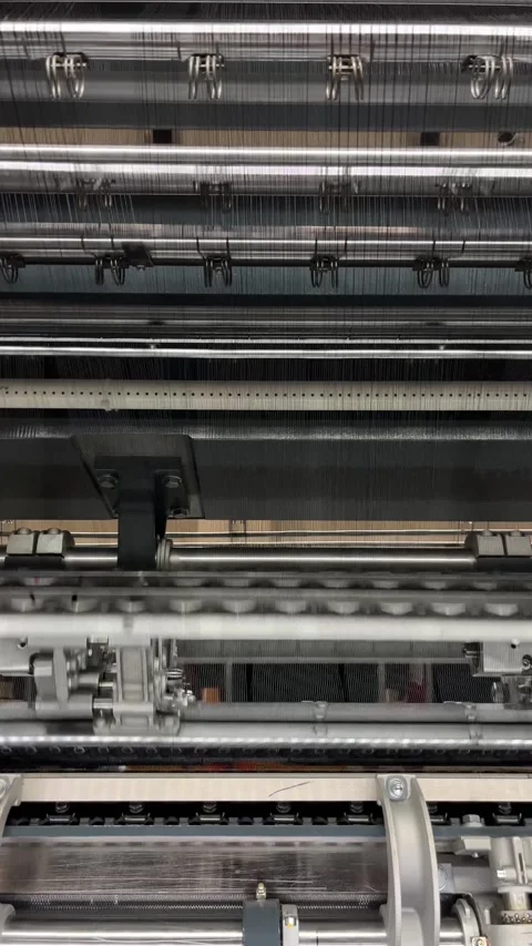 Industrial knitting machine for knitting textile fabrics Stock Footage 239682875