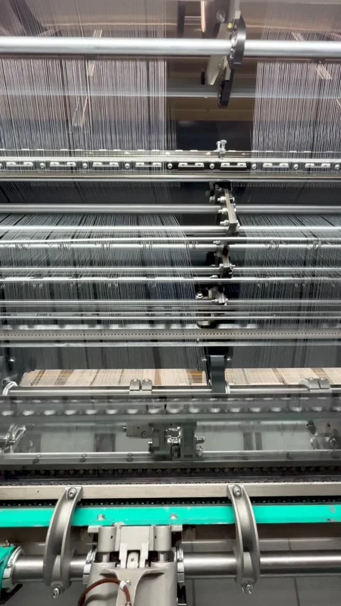Industrial knitting machine for knitting textile fabrics Stock Footage 239682905