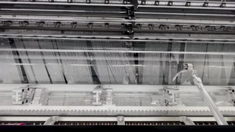 Industrial knitting machine for knitting textile fabrics Stock Footage 239683382