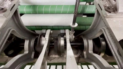 Industrial knitting machine for knitting textile fabrics Stock Footage 240129189