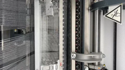 Industrial knitting machine for knitting textile fabrics Stock Footage 240129685