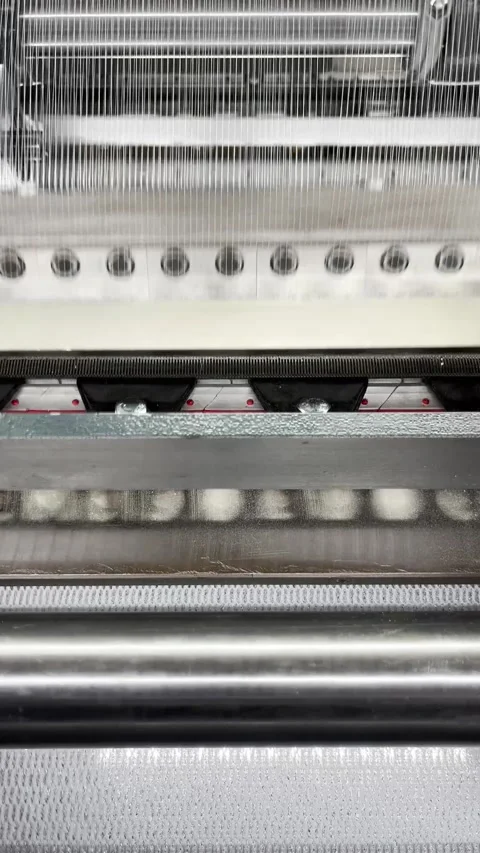 Industrial knitting machine for knitting textile fabrics Stock Footage 251832406