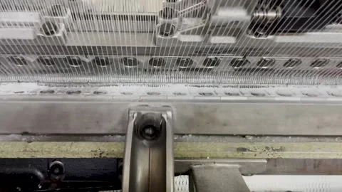 Industrial knitting machine for knitting textile fabrics Stock Footage 263358456
