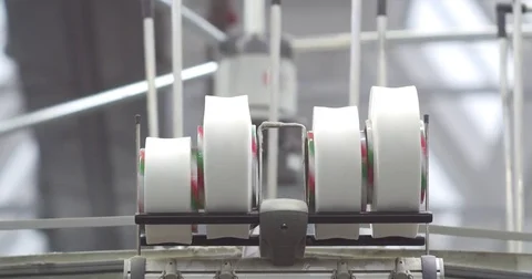 Industrial knitting machine producing cotton yarn Stock Footage 75825599
