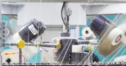 Industrial knitting machine producing cotton yarn Stock Footage 75825615