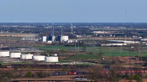 Industrial landscape with freight train and power plant Stockbeeldmateriaal 339263527