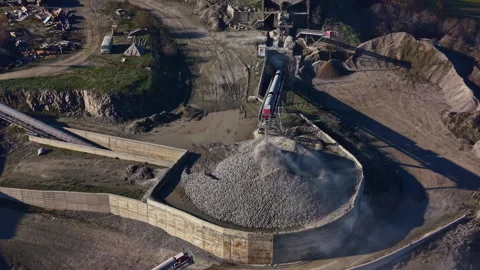 Industrial landscape showcasing a stone processing area with equipment working Stock Footage 336630283
