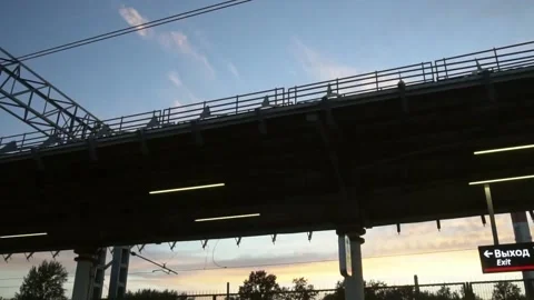 Industrial landscape at sunset, view from the train window Video stock 133429837