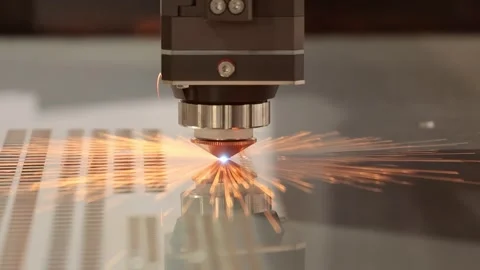 Industrial laser cutting machine processing metal sheet with sparks and glo.. Stock Footage 337349933