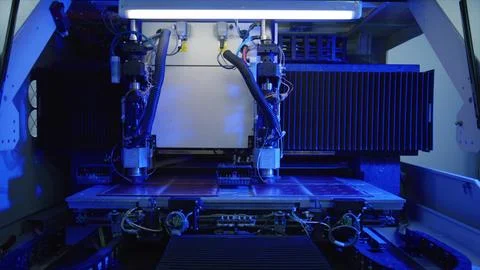 Industrial laser cutting machine processing metal sheet in factory Stockfoto's
