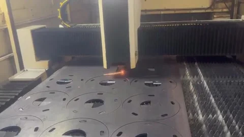 Industrial Laser Cutting Process of Metal Sheet Stock Footage 337126160