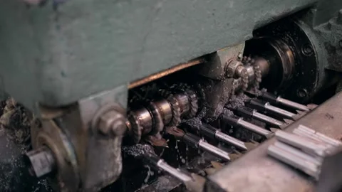 An industrial lathe processes metal. Tool manufacturing. Production of drills. Stock Footage 171775813