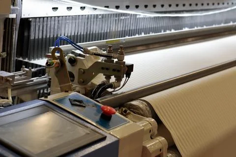 Industrial loom with touch screen control panel Stock Photos