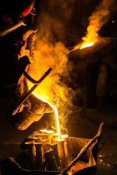 Industrial lost wax casting. The process of pouring for filling out ceramic Stock Photos